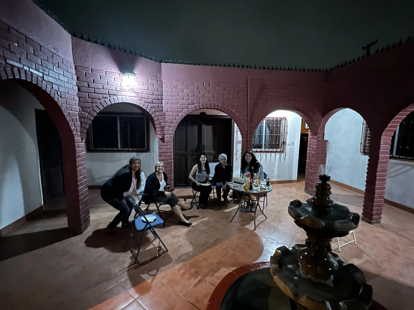 Friends gathered for a housewarming party in the new Ensenada house