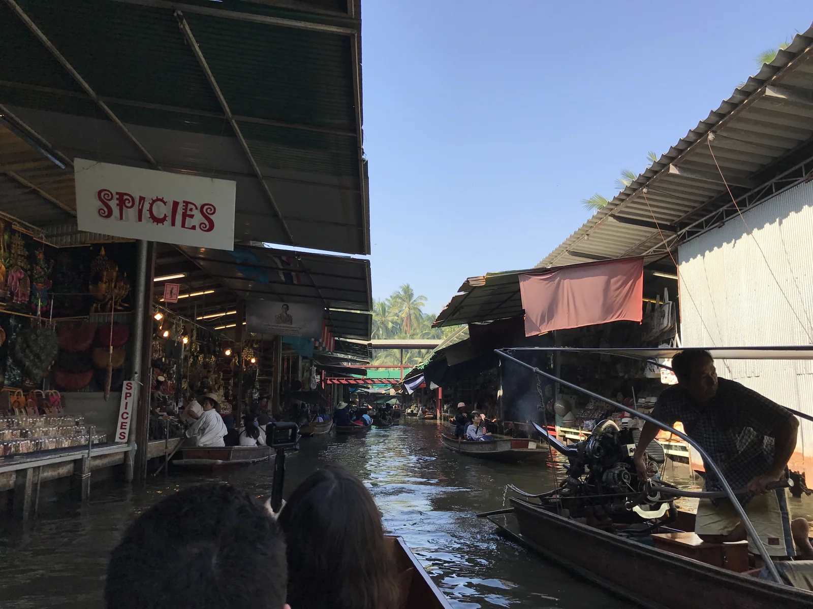 A vendor at a floating market in Thailand