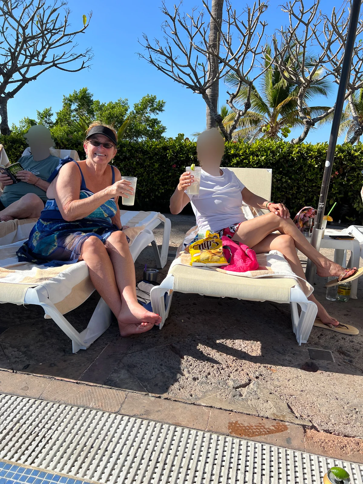 The two moms at the pool in Mazatlán, March 2024 — this was their thing by this point