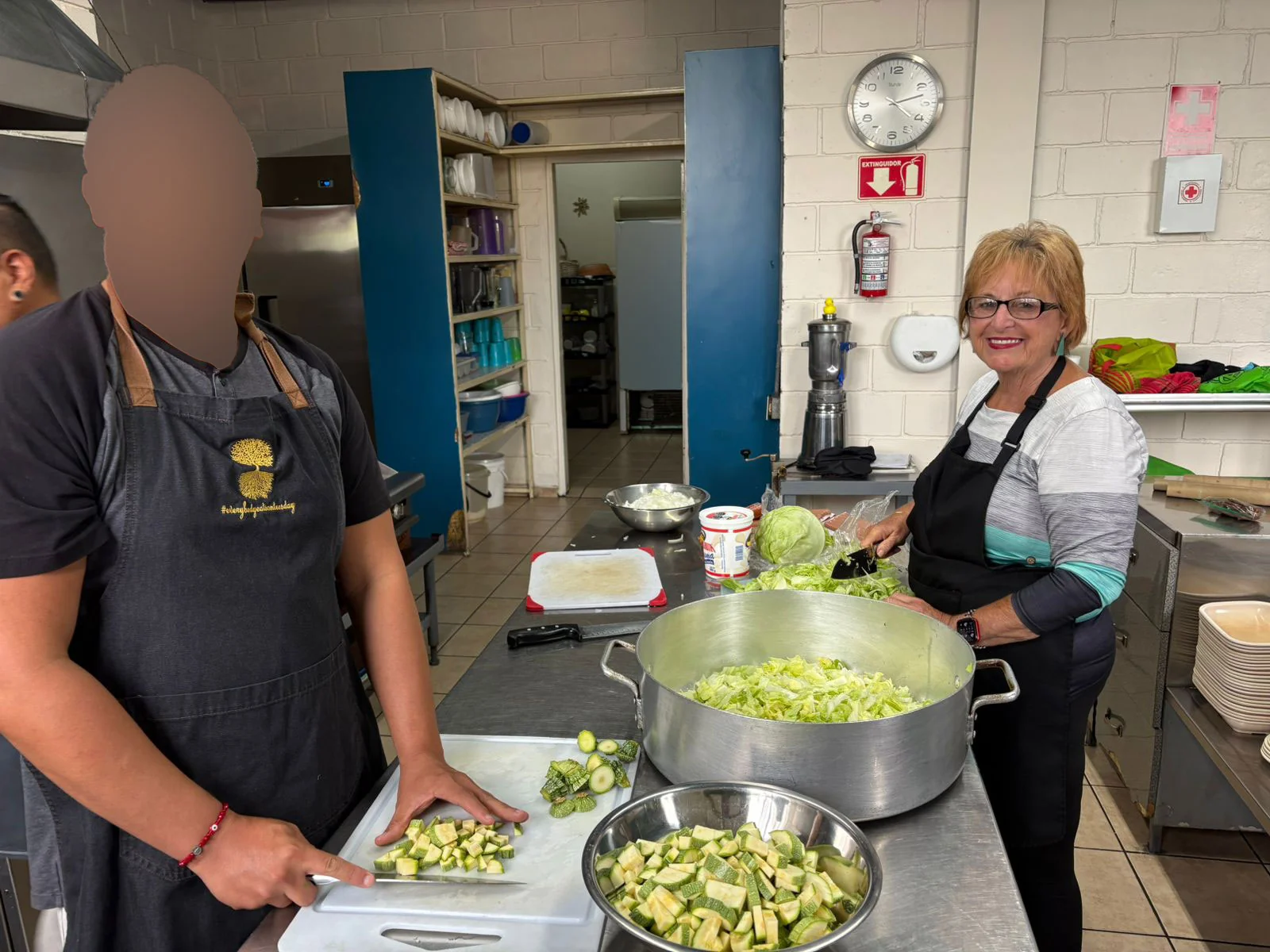Cooking together at Albergue San Vicente in Ensenada, a community kitchen — one of those ordinary days that added up